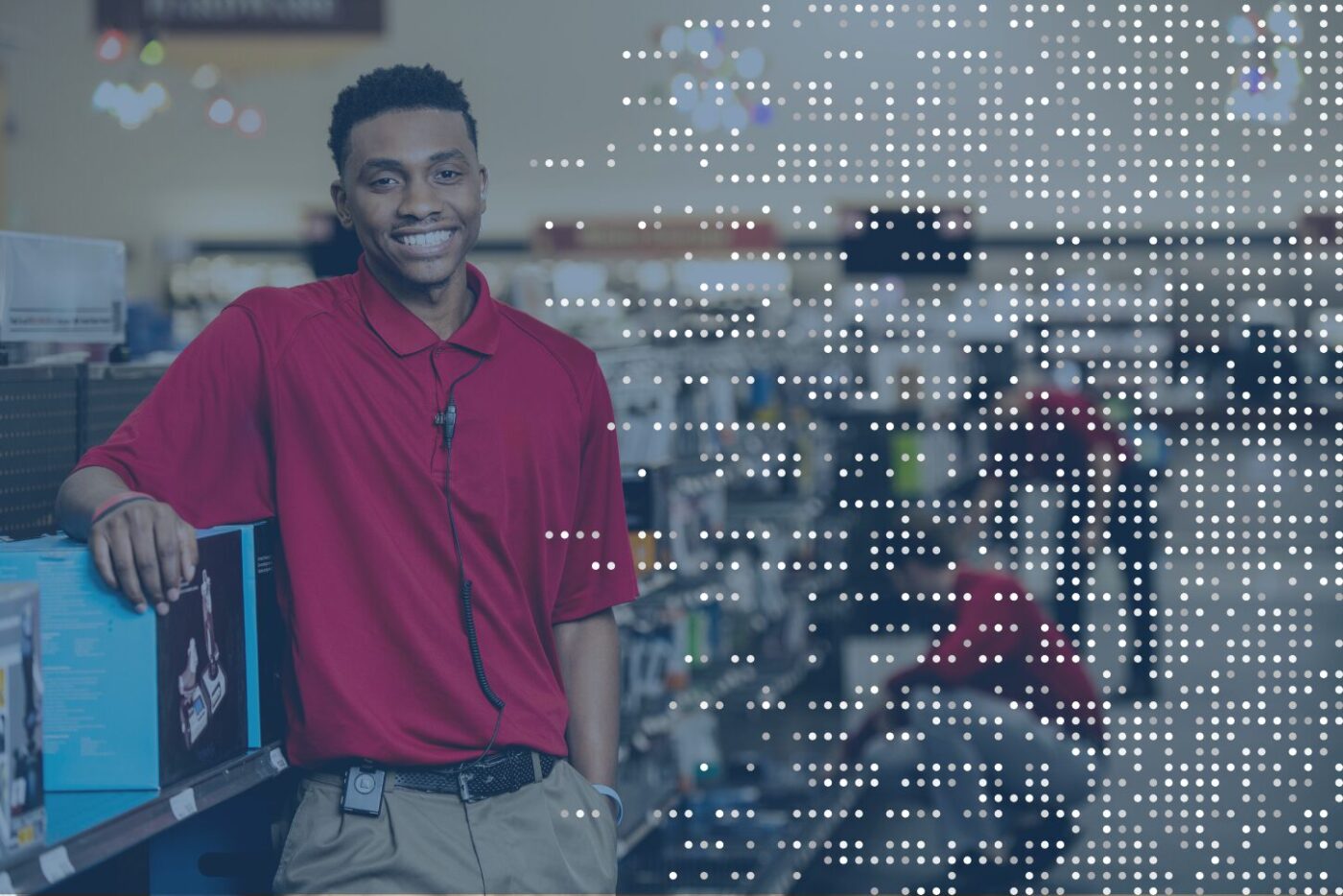 "Smiling retail associate wearing a headset powered by TheatroIQ, demonstrating the seamless in-ear communication and real-time support offered by Theatro’s innovative platform.